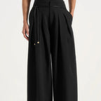 Black high waisted pleated wide leg trousers