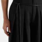 Black high waisted pleated wide leg trousers