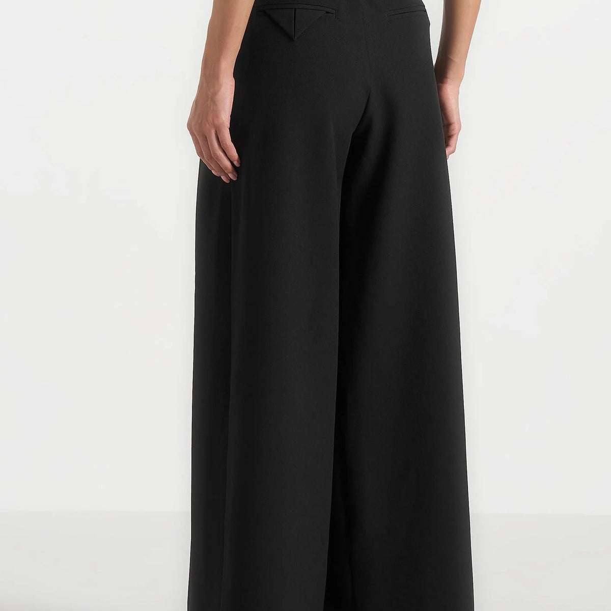 Black high waisted pleated wide leg trousers